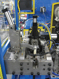 Hydraulically operated end forming / roll forming machine.